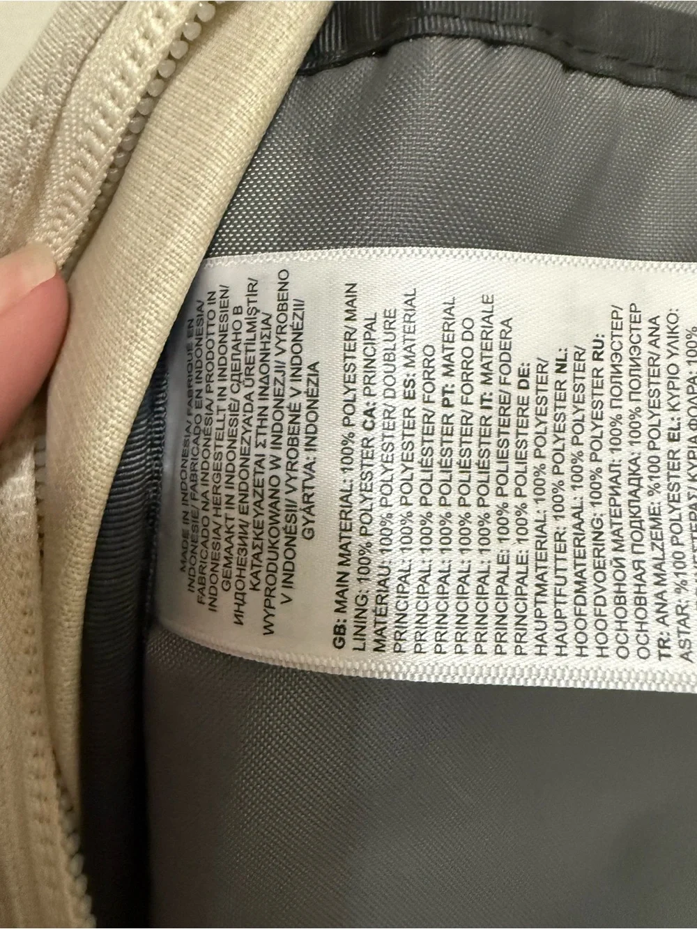 The North Face Two-Tone Beige and Black Backpack with Bungee Front